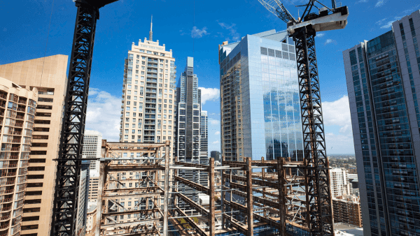 An image illustrating the Sydney building boom with the new skyscrapers and constructions occurring in Sydney CBD, Australia